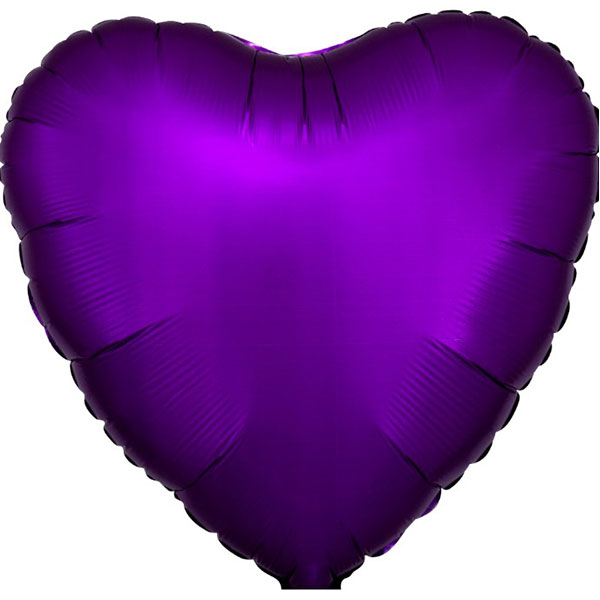 Purple heart-shaped balloon on a white background
