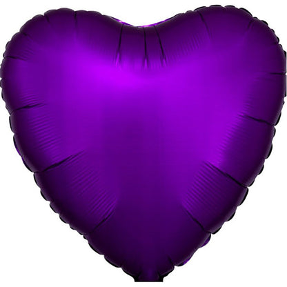 Purple heart-shaped balloon on a white background