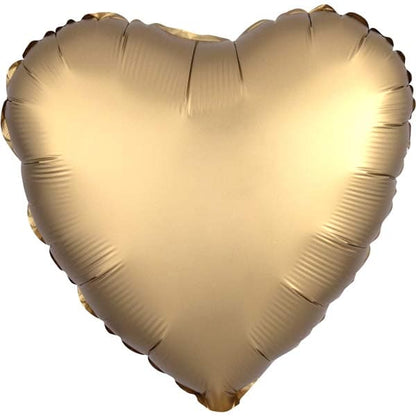 Gold heart-shaped balloon on a white background