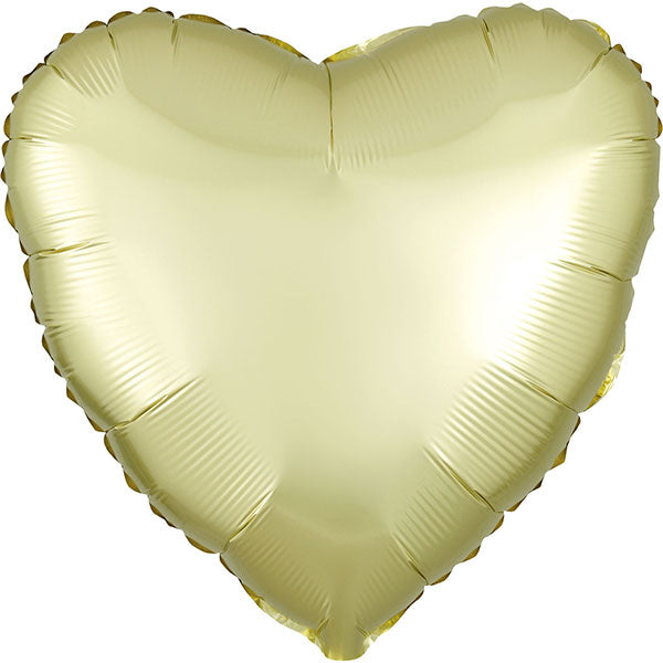 Heart-shaped balloon in a light yellow color on a white background